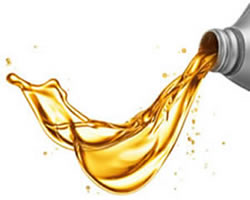 Image of oil splashing from a bottle